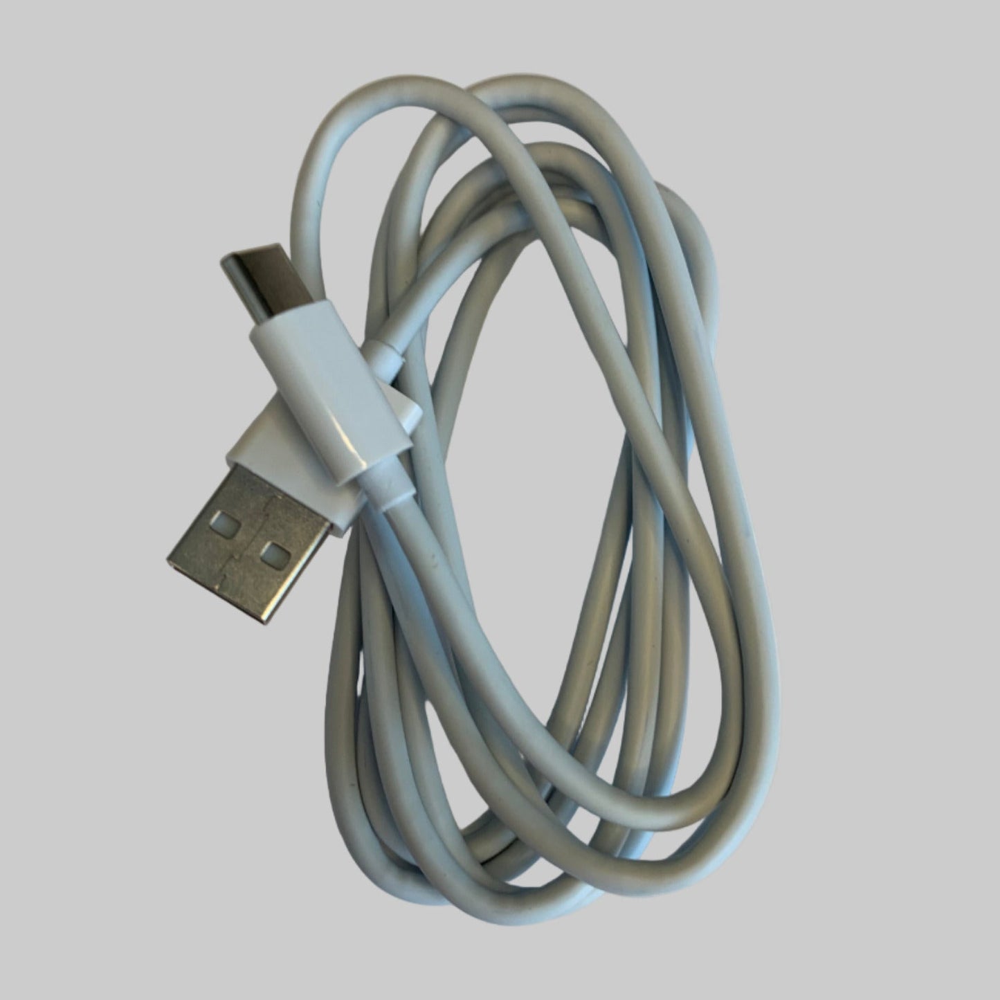 Coiled USB-C cable on a white background